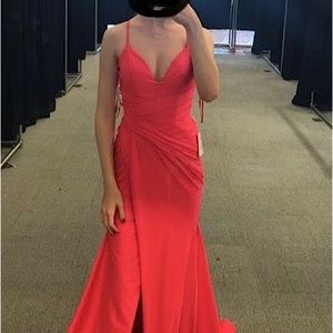 Beautiful and flattering prom, special occasion dress in gorgeous coral color